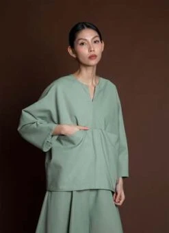 KAAREMArctic Long Sleeve Slit Pocket Top - Light Sage Green 13 KAAREMArctic Long Sleeve Slit Pocket Top - Light Sage Green -ANINE BING || ULLA JOHNSON || AGOLDE Shop Arctic Long Sleeve Slit Pocket Top Light Sage Green 20231031053926 1