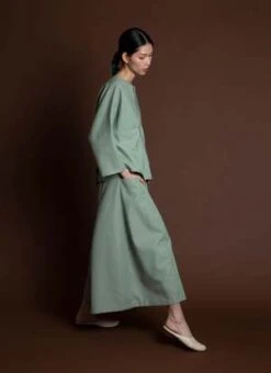 KAAREMArctic Long Sleeve Slit Pocket Top - Light Sage Green 21 KAAREMArctic Long Sleeve Slit Pocket Top - Light Sage Green -ANINE BING || ULLA JOHNSON || AGOLDE Shop Arctic Long Sleeve Slit Pocket Top Light Sage Green 20231031053928 1