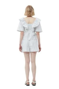 GanniStripe Seersucker Ruffle Blouse - Mauve/Chalk -ANINE BING || ULLA JOHNSON || AGOLDE Shop Stripe Seersucker Ruffle Blouse Mauve Chalk 20230614000900 2